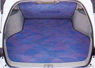 Reversible luggage mat